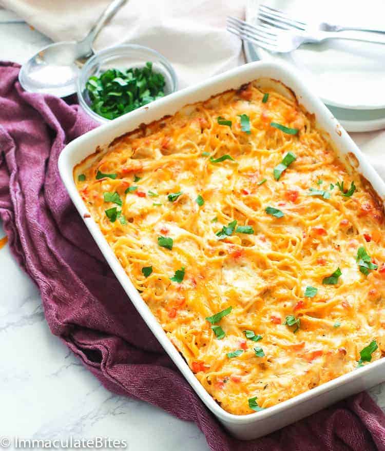 Baked chicken spaghetti â€“ a gooey, hearty casserole dish with flavorful cheese 