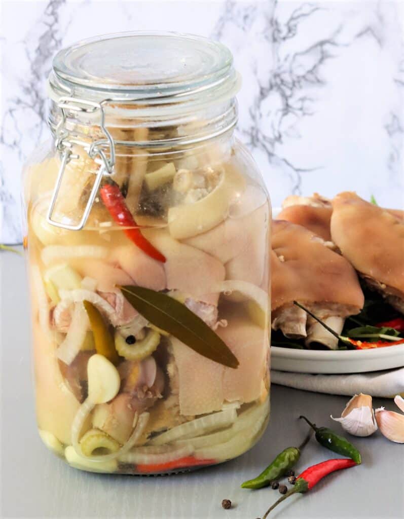 A jar of pickled pigs feet