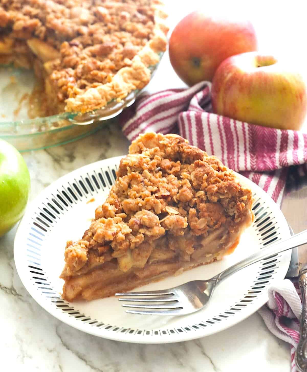 Serving up a slice of fresh apple pie made Dutch style.