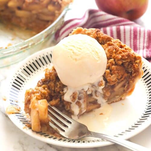Enjoying freshly baked apple pie with vanilla ice cream.