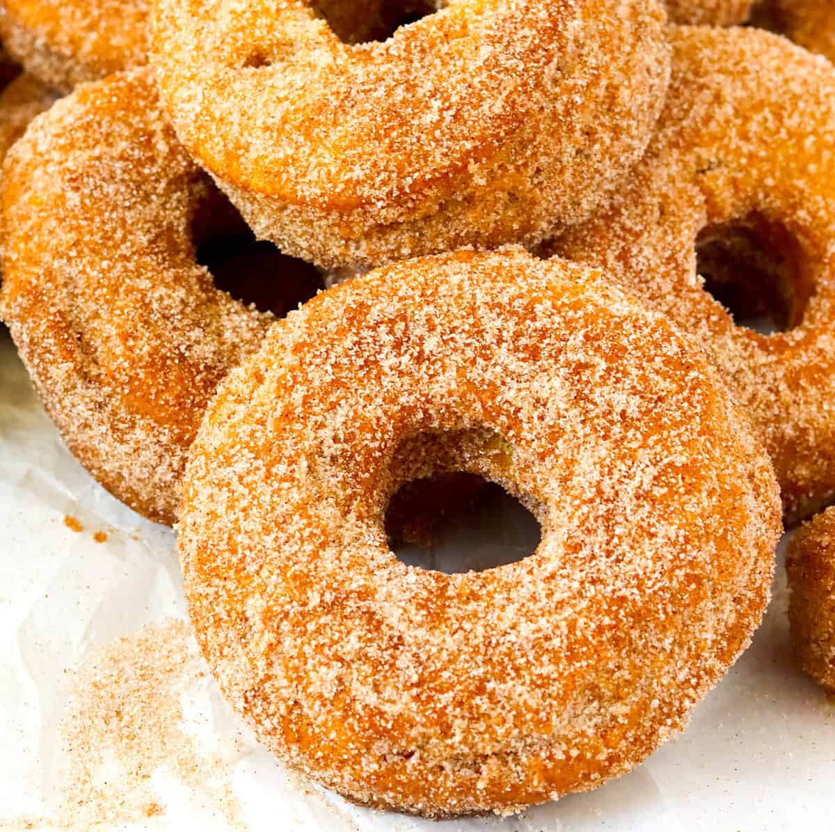 A close-up of insanely delicious apple cider doughnuts