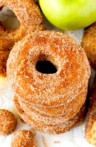 A stack of decadent apple cider donuts