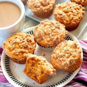Fresh sweet potato muffins with streusel topping and hot coffee with cream