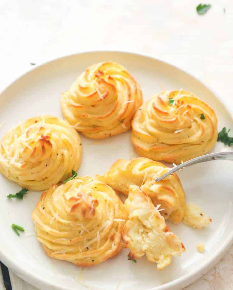 Duchess potatoes with a creamy soft interior and golden crusty exterior