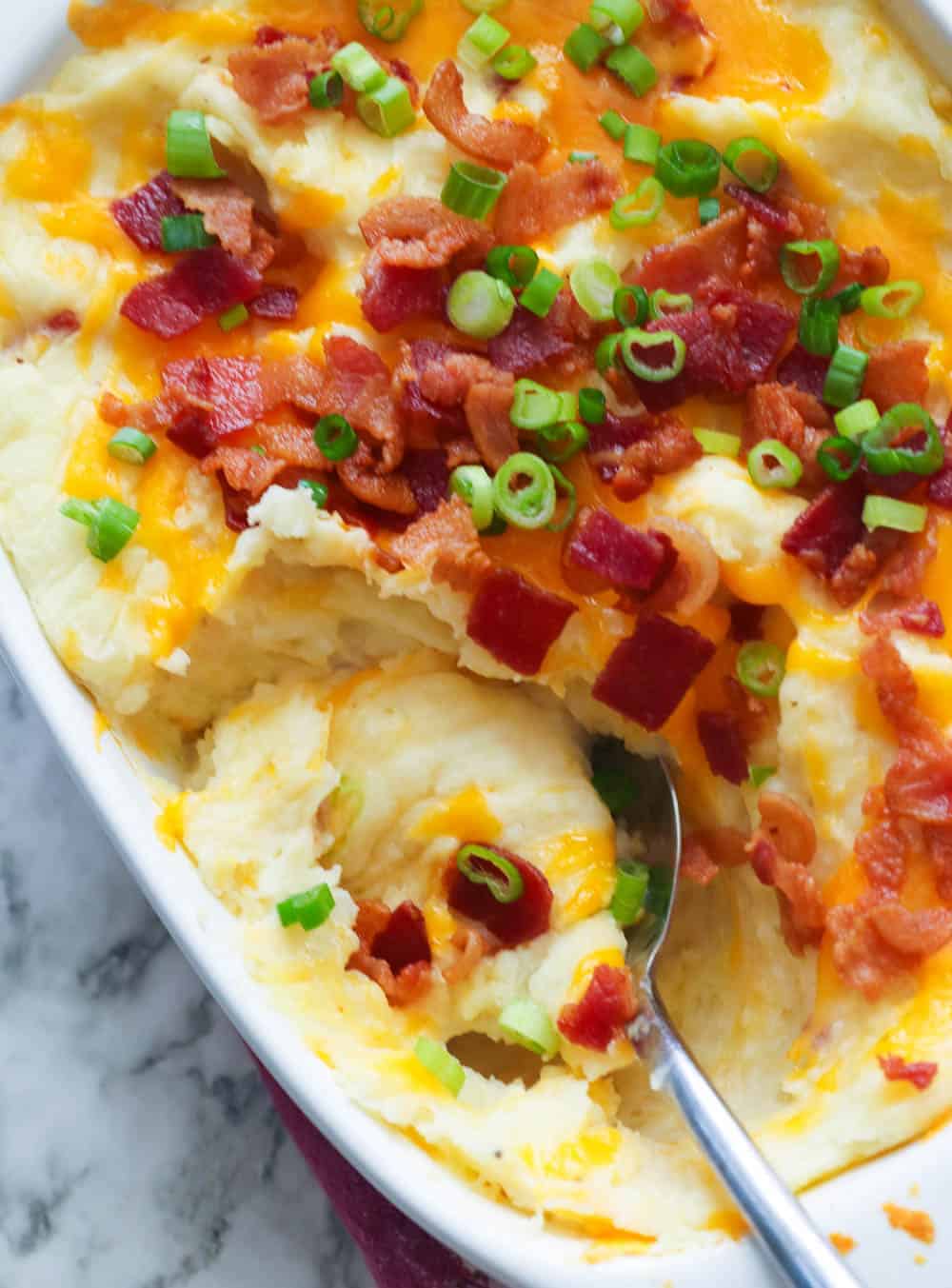 This Loaded Mashed Potato Casserole enjoys fully loaded baked potato flavors in a ridiculously easy casserole dish.