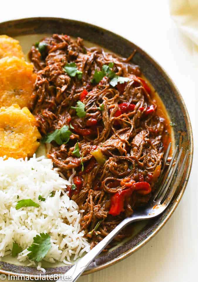 Ropa vieja with rice and tostones for pure yum
