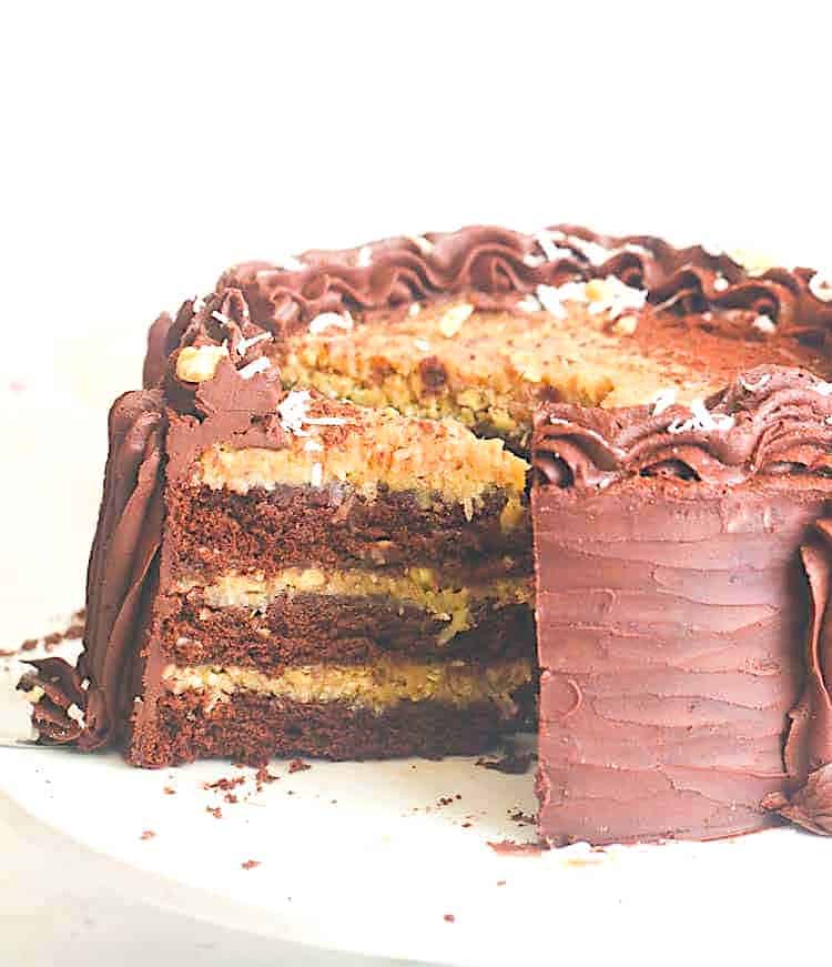 Decadent German chocolate cake sliced and ready to serve