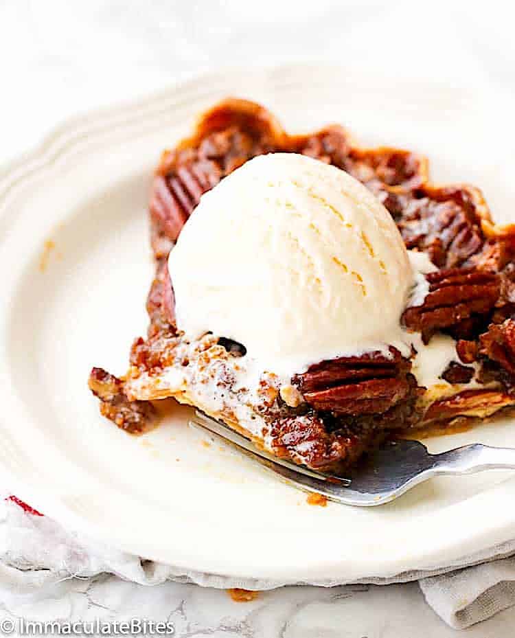 Enjoying soul-satisfying pecan pie with a scoop of ice cream