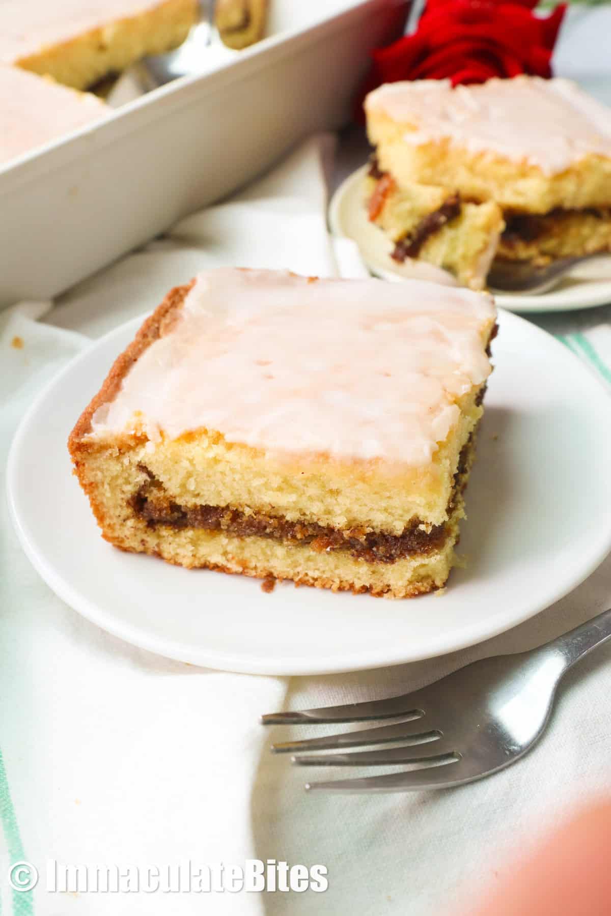 Enjoy this honey bun cake with cinnamon and spice swirls