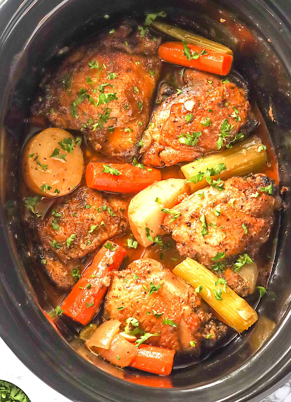 Slow cooker chicken thighs ready to serve