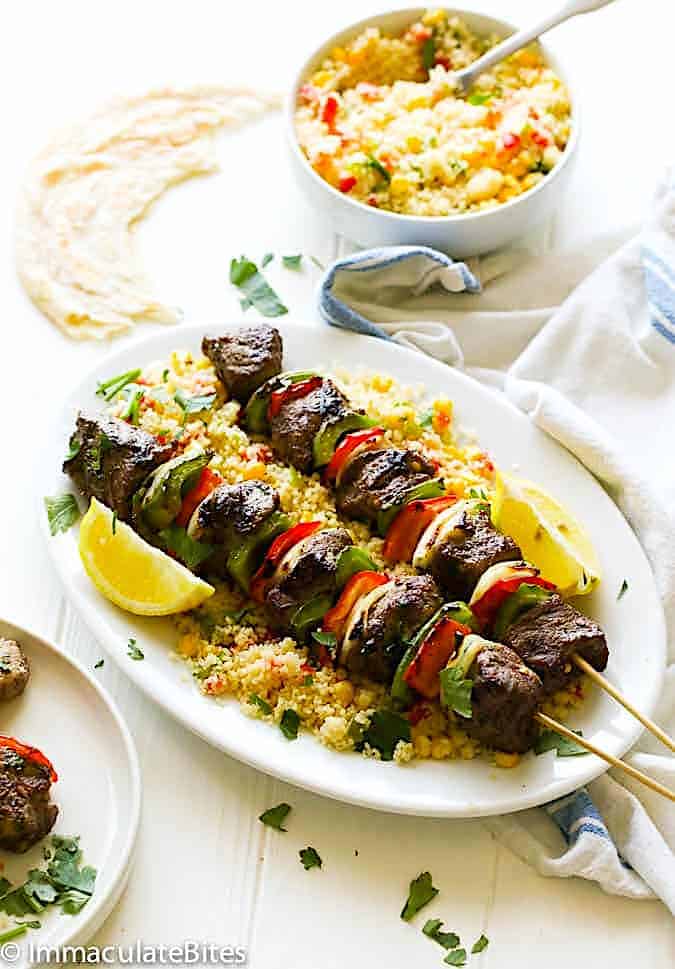 Enjoy chapati with steak kabobs and couscous