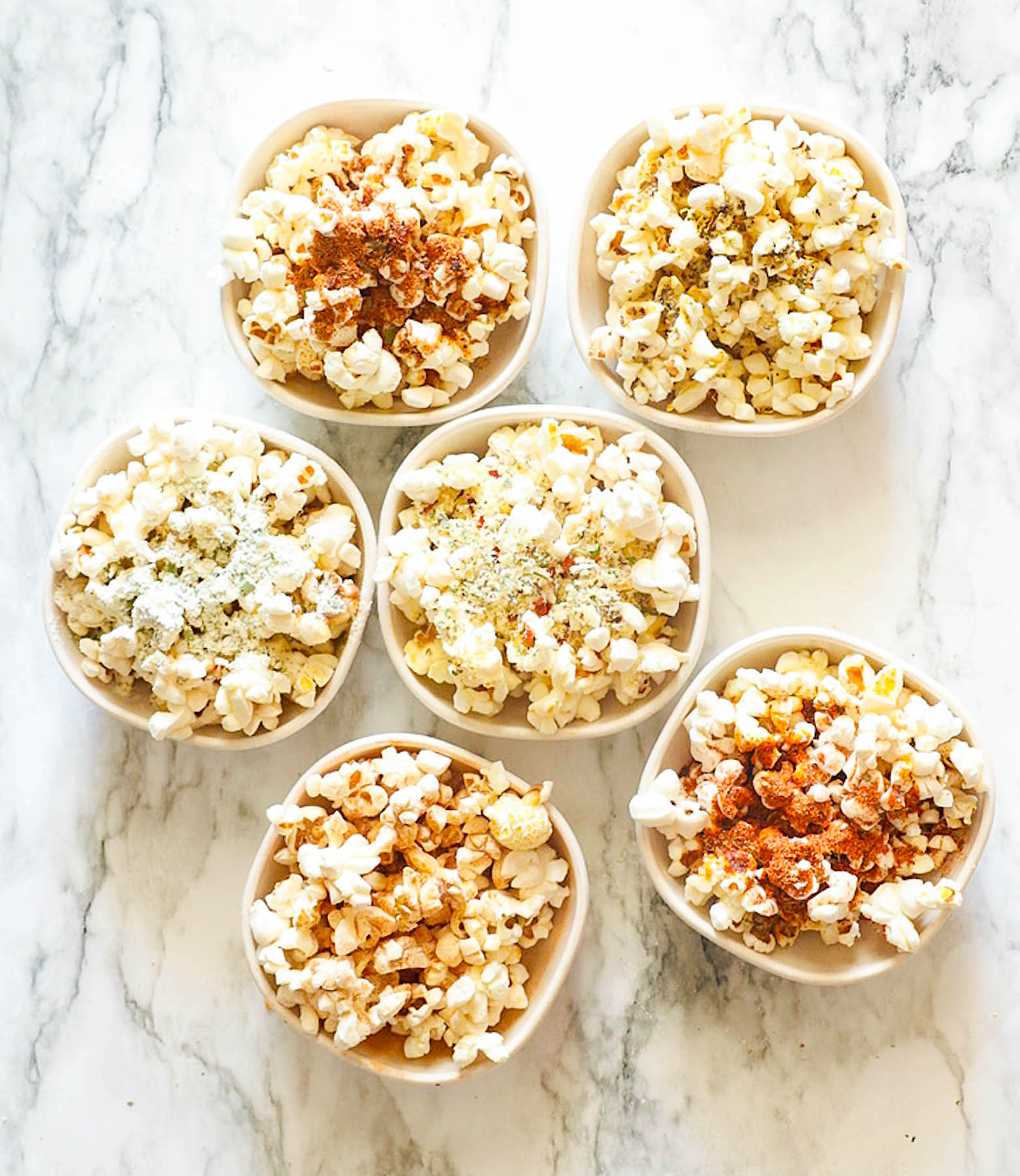 Six different popcorn seasonings, sweet and savory