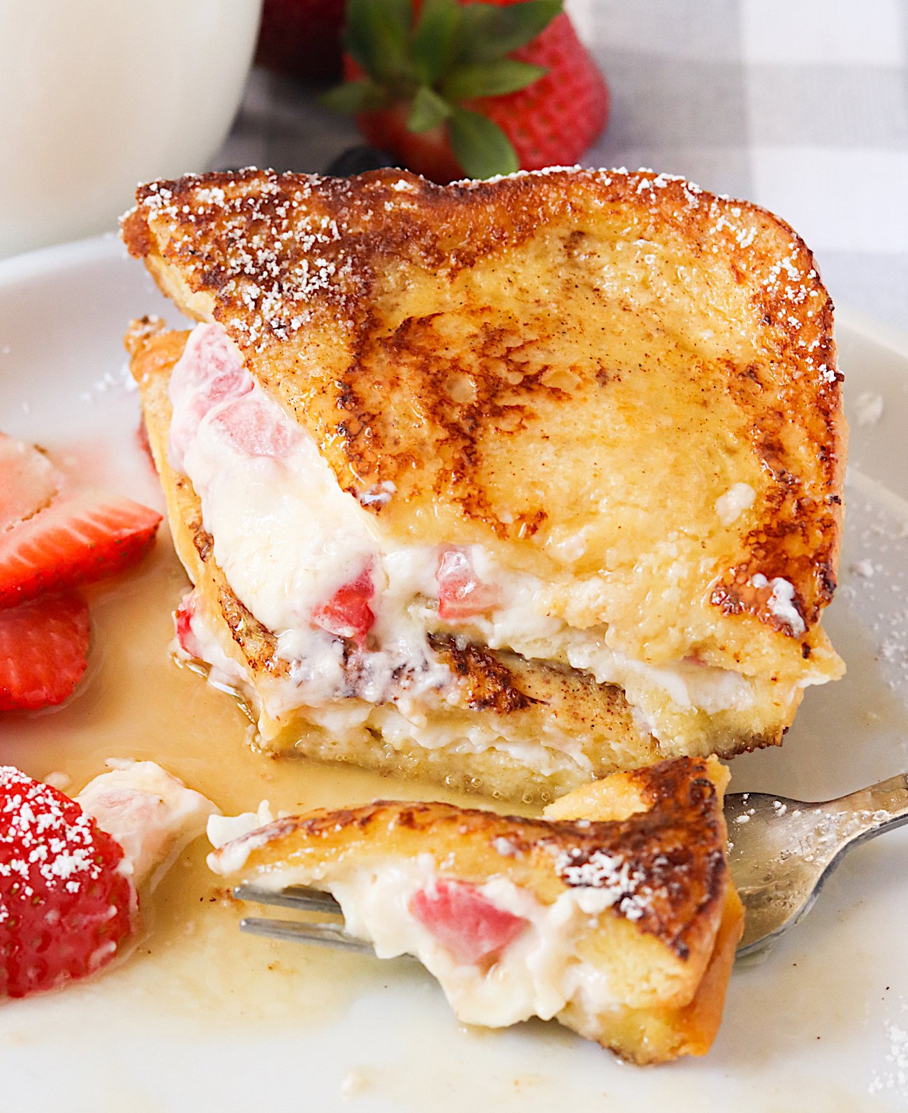 Biting into insanely delicious stuffed French toast