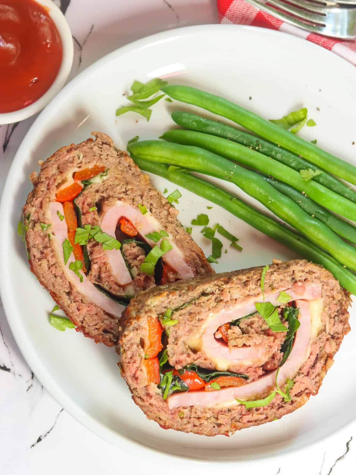 Enjoy stuffed meatloaf with roasted green beans