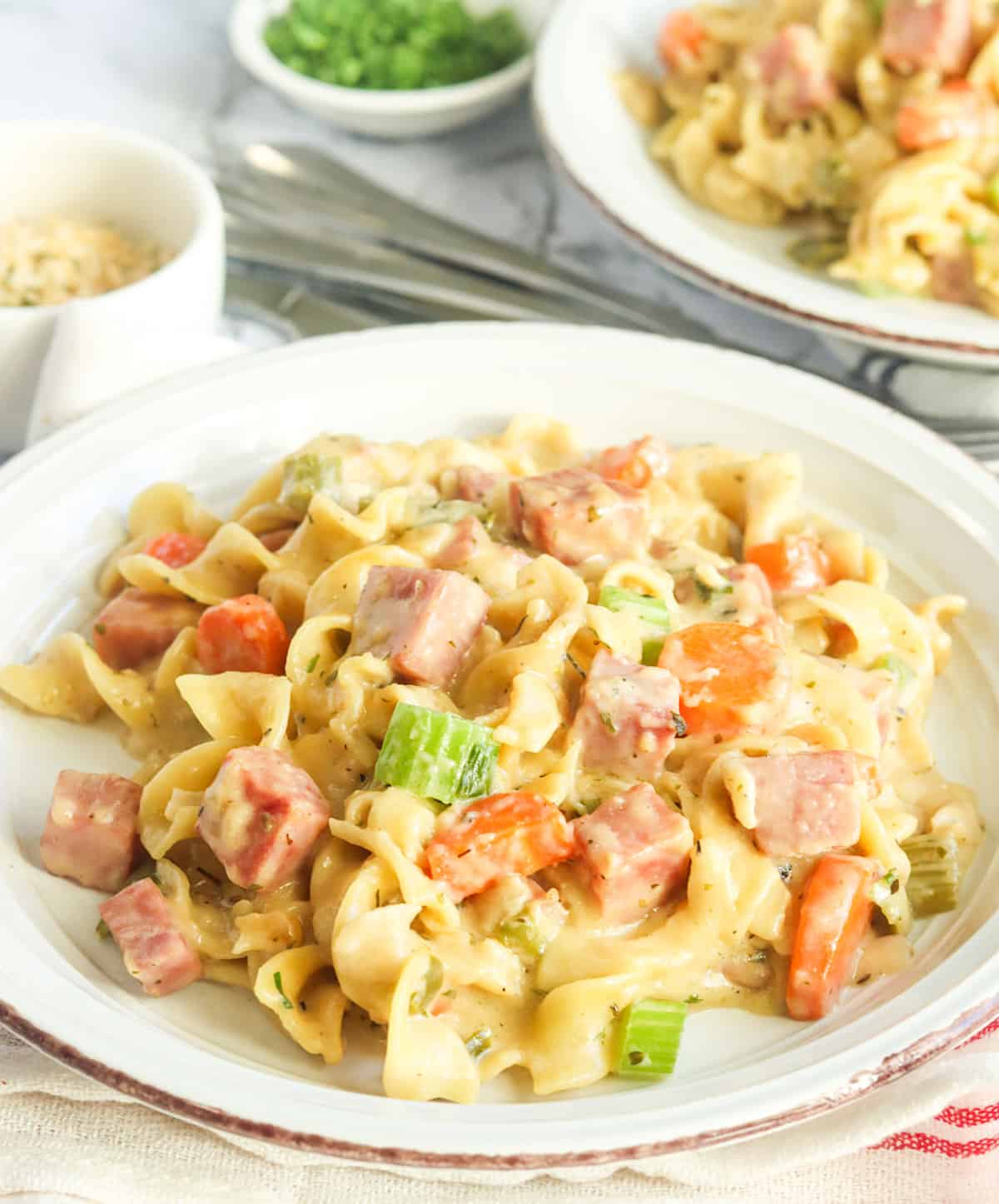 Serving up a plateful of decadantly creamy ham casserole