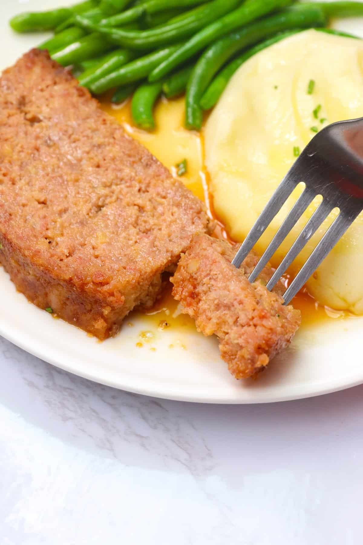 Enjoying a soul-satisfying ham loaf with roasted green beans and mashed potatoes