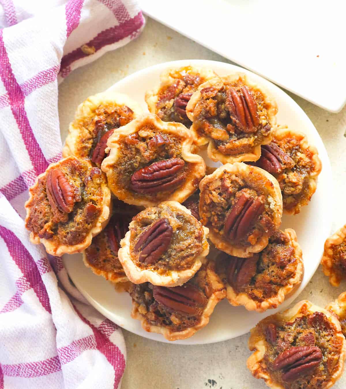 A platter of insanely delicious mini pecan pies