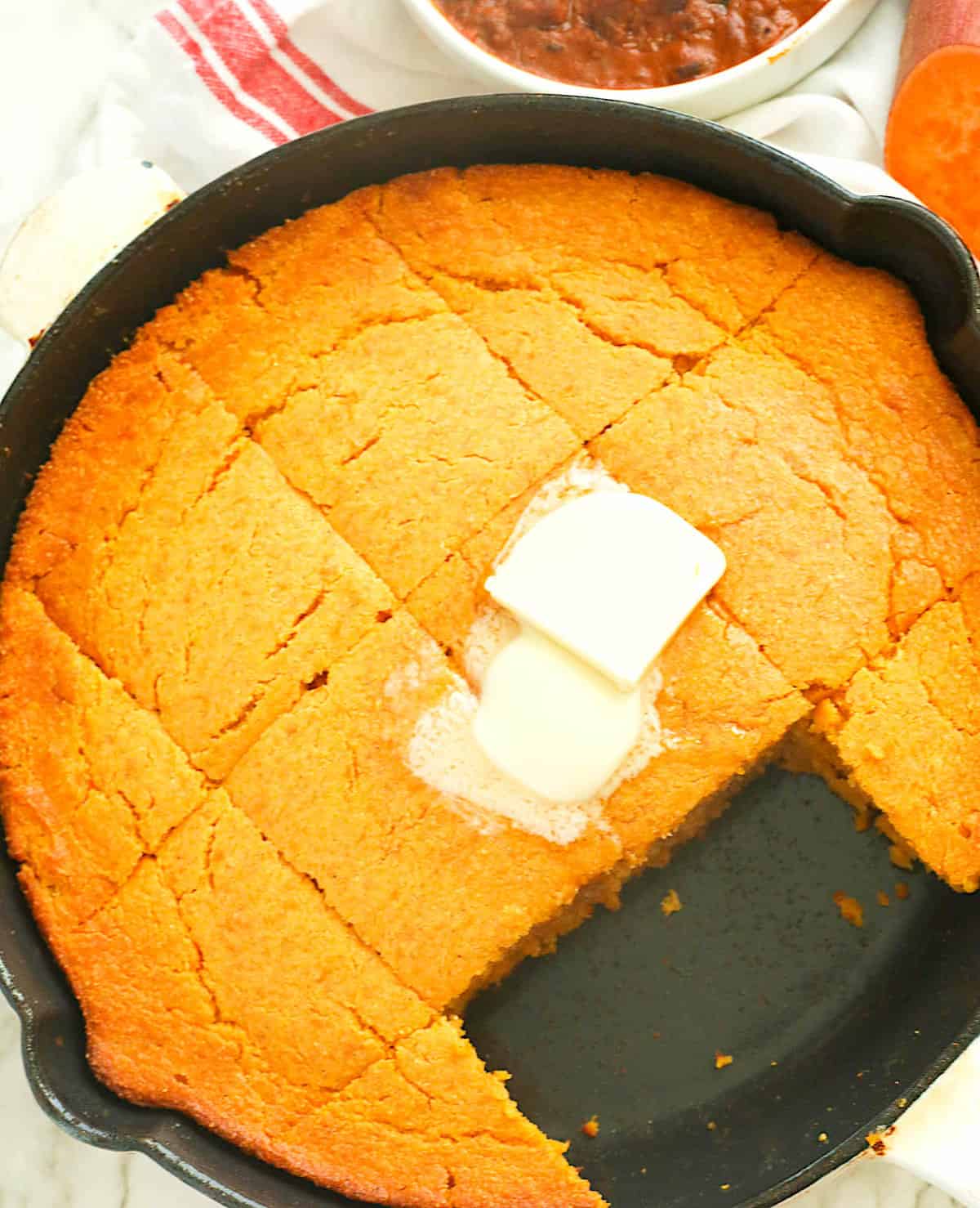 Sliced and buttered sweet potato cornbread for pure comfort