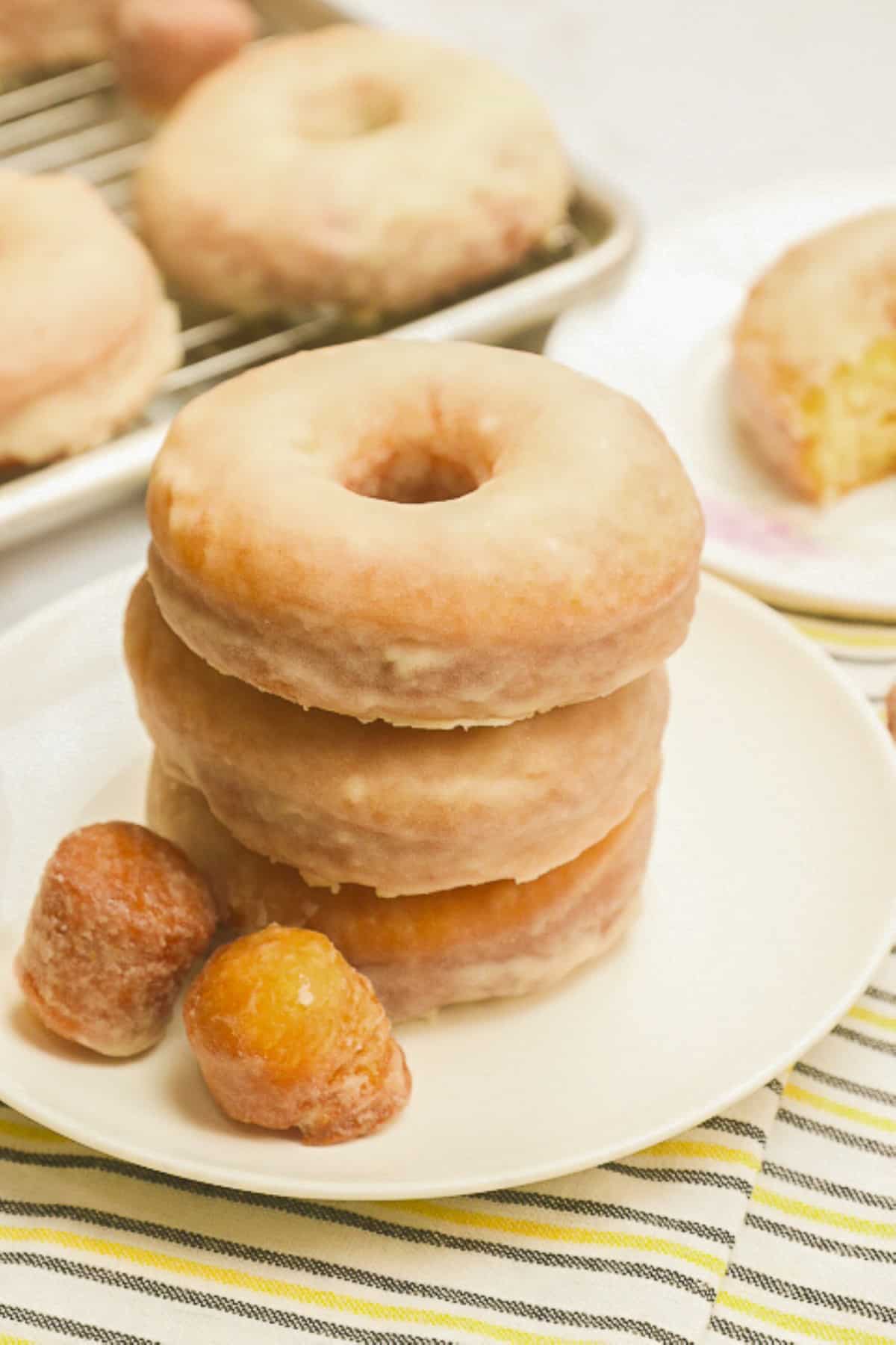 A stack of decadent glazed donuts ready to indulge