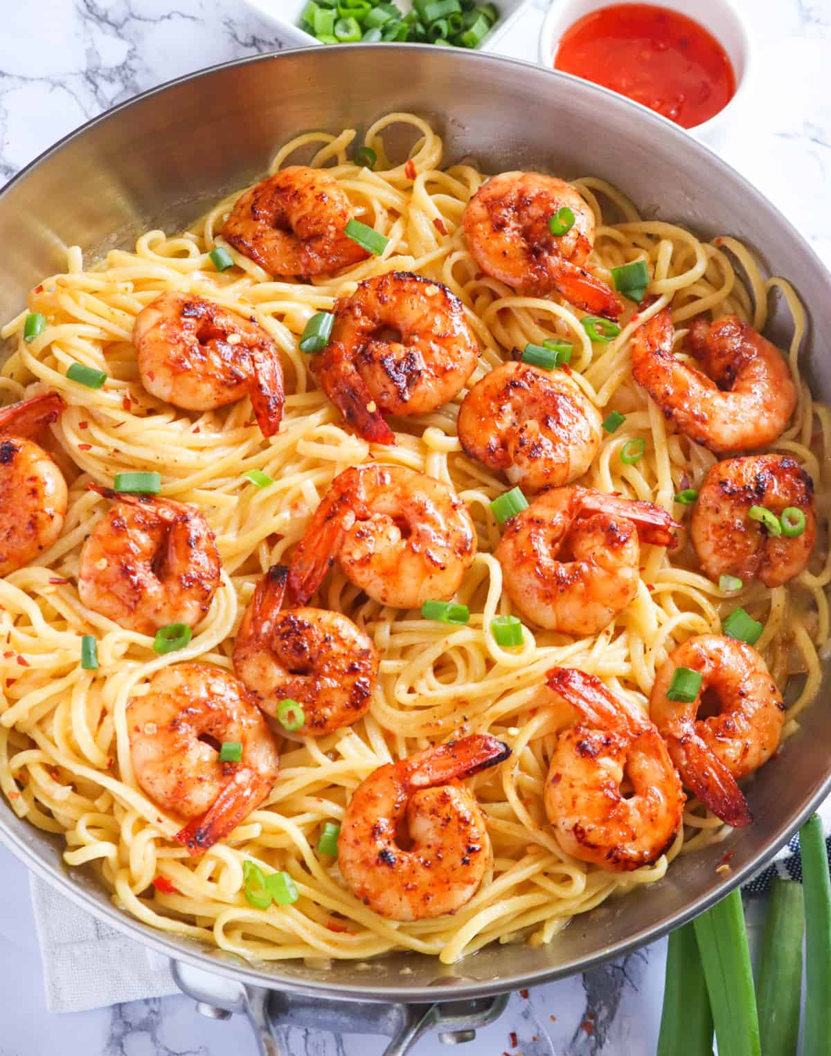 Serving up delicious, steaming bang bang shrimp pasta