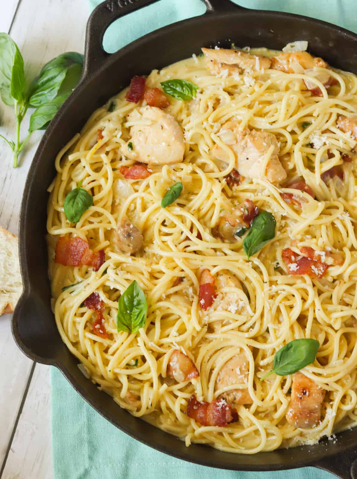 Mouthwatering chicken carbonara in a skillet ready to serve.