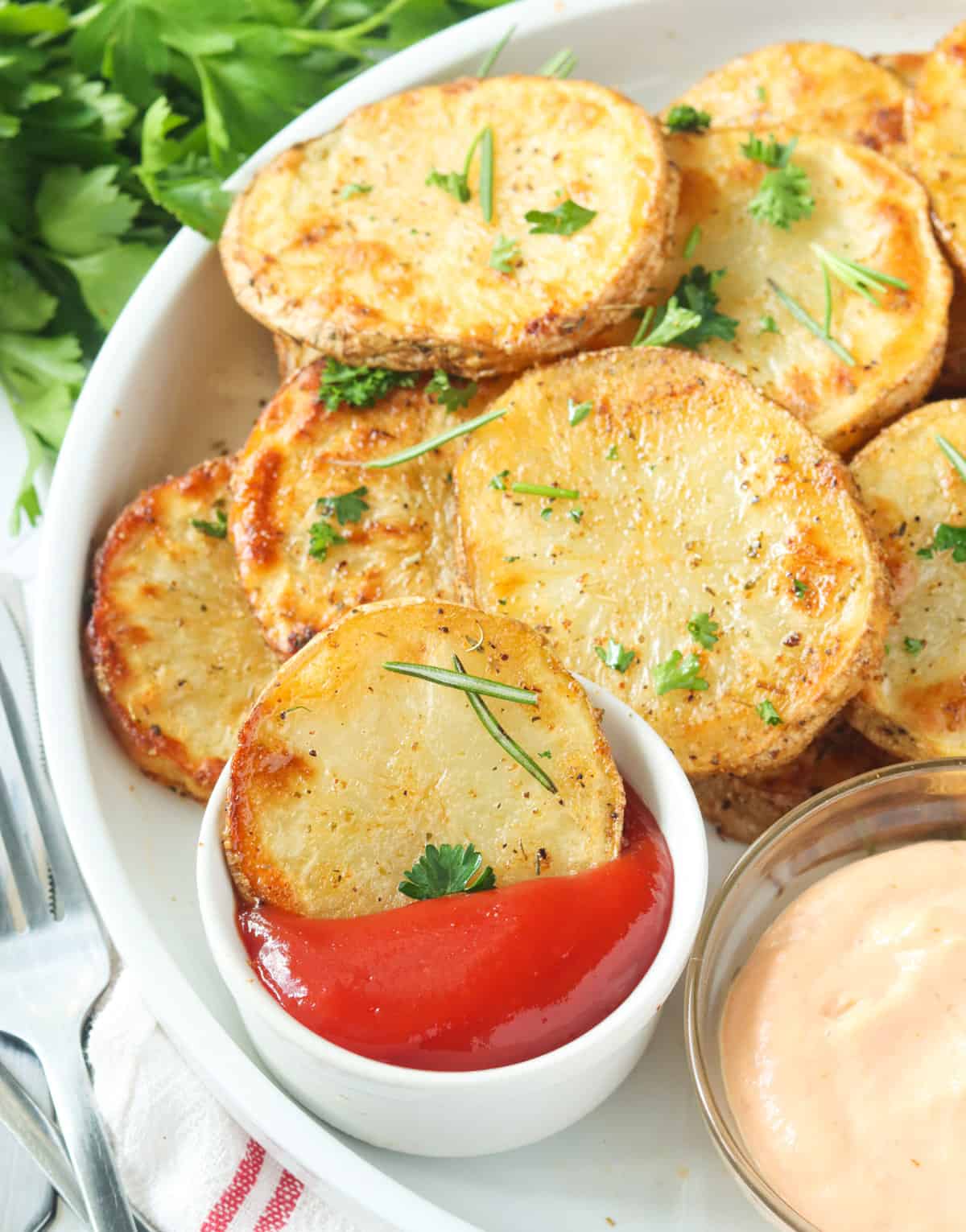 Dipping cottage fries in ketchup for true comfort food