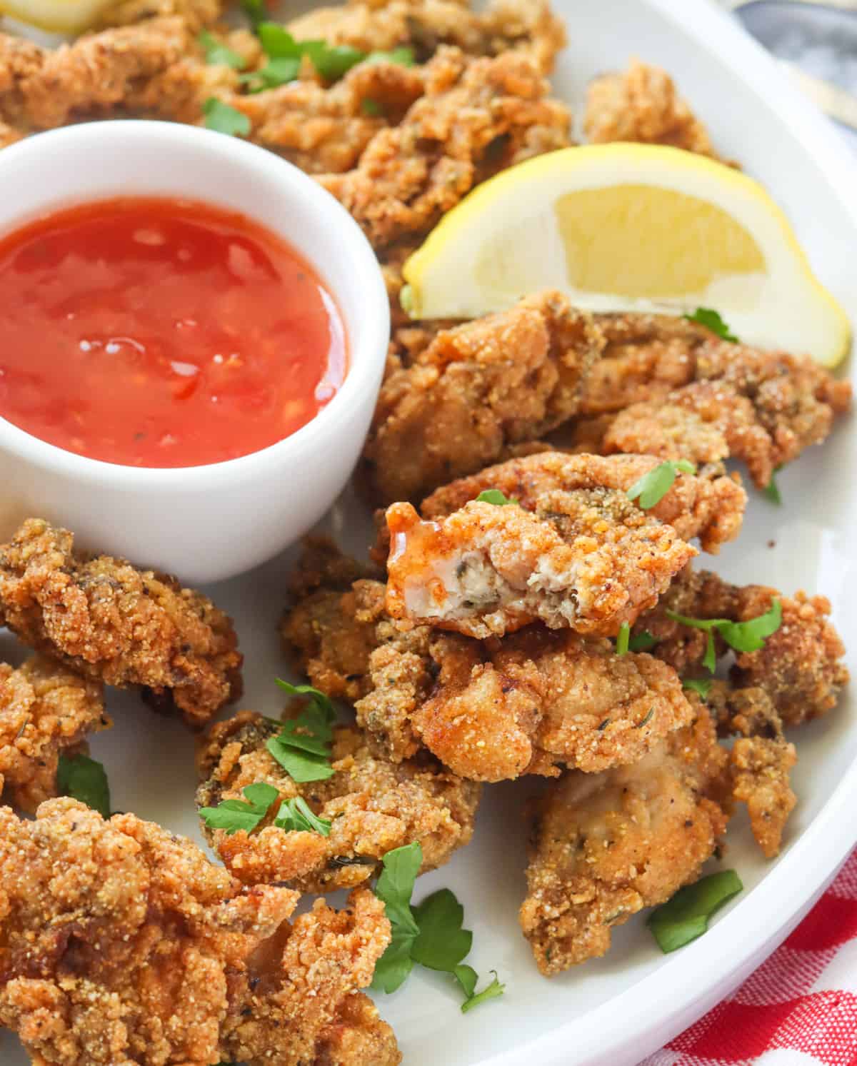 Taking a bite out of a delicious fried oyster