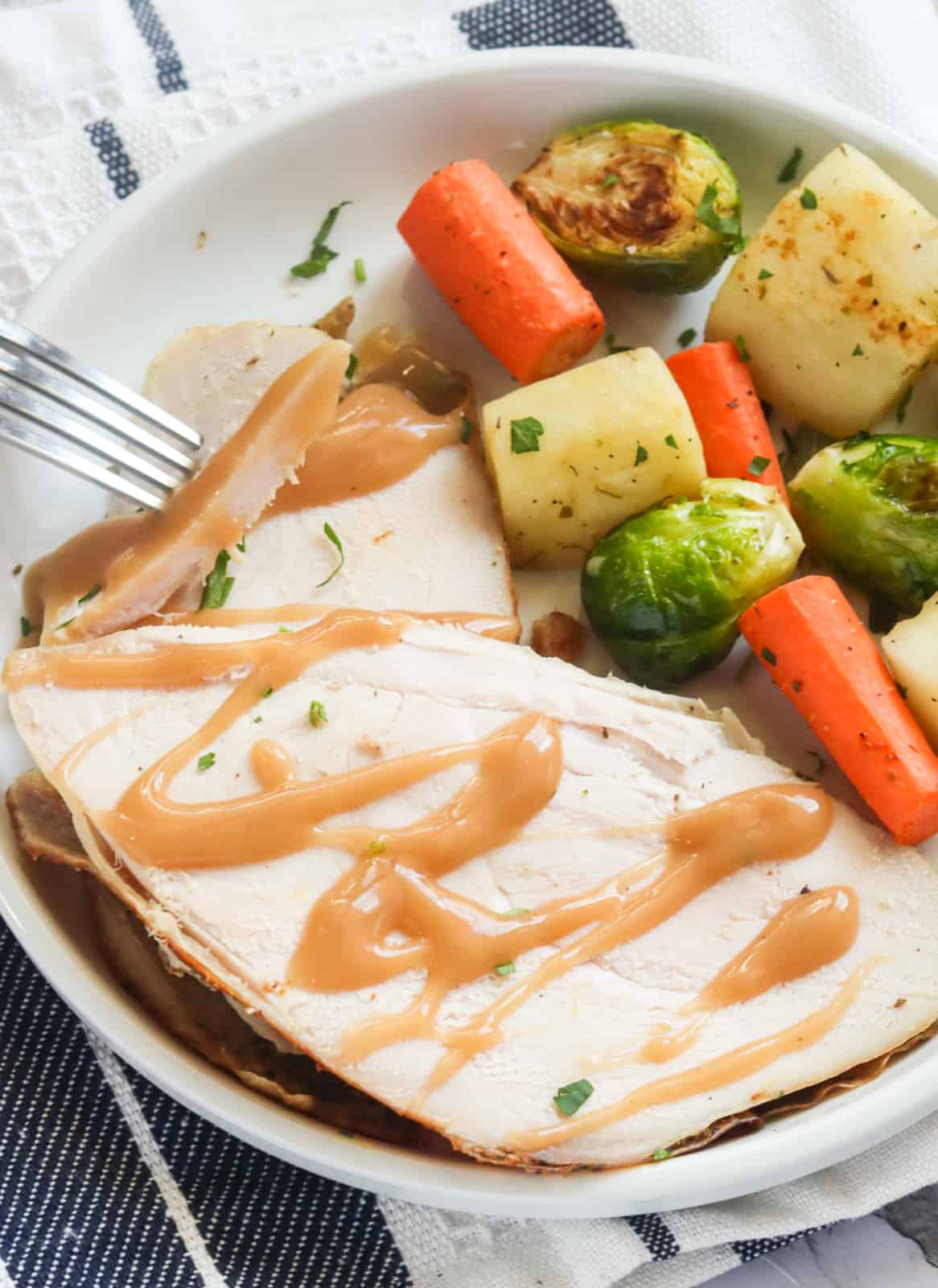 Enjoy roast turkey crown with veggies for an easy holiday