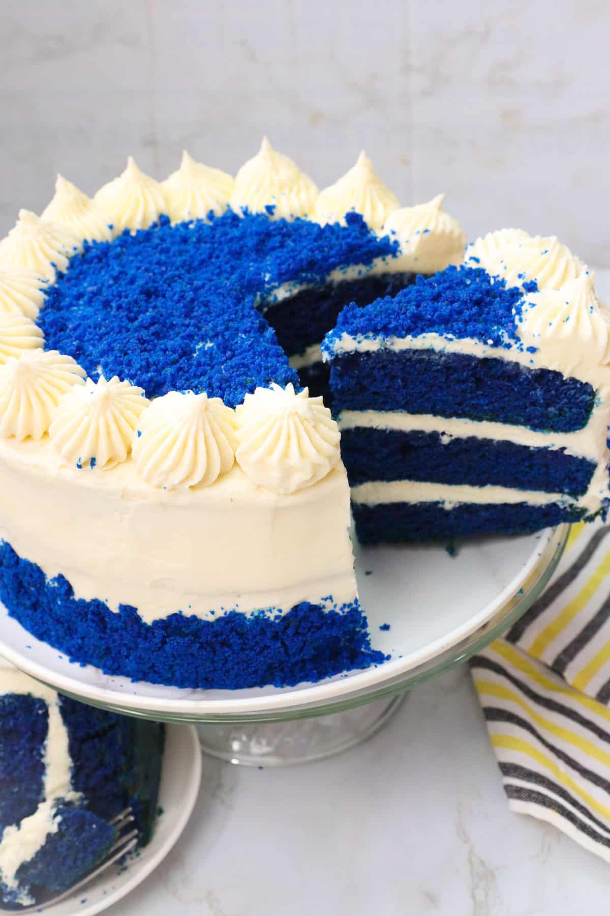 Serving a gorgeous slice of Blue Velvet Cake