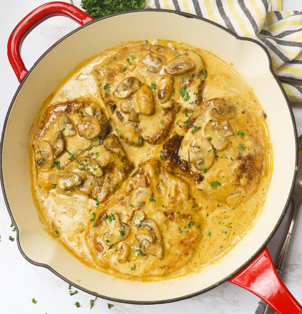 Hot from the stove pork chops smothered in cream of mushroom sauce