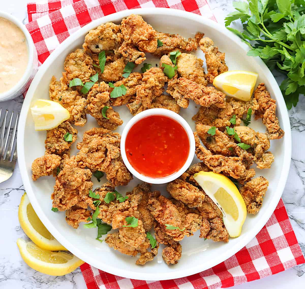 A platter of freshly fried oysters for an impressive game day appetizer