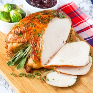 Slicing into a freshly roasted turkey crown for a festive occasion