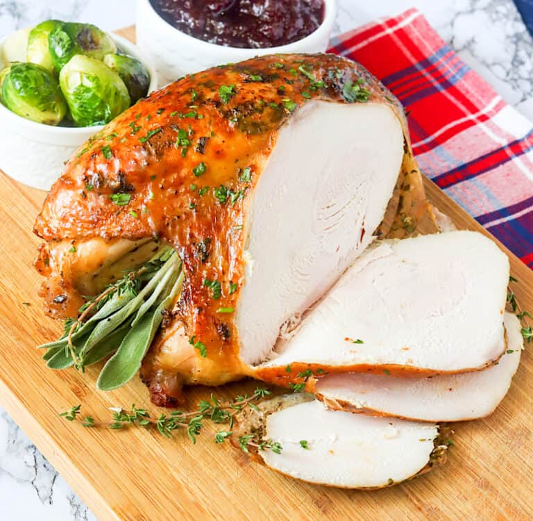 Slicing into a freshly roasted turkey crown for a festive occasion