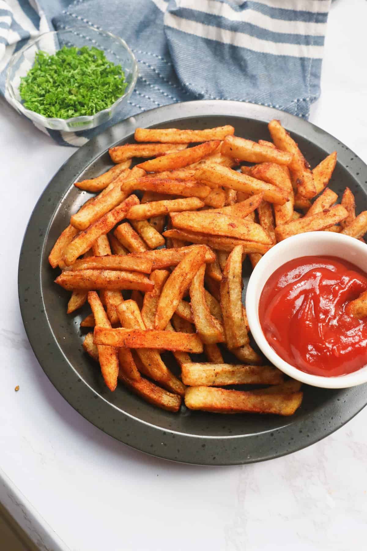 A plateful of crispy Cajun fries