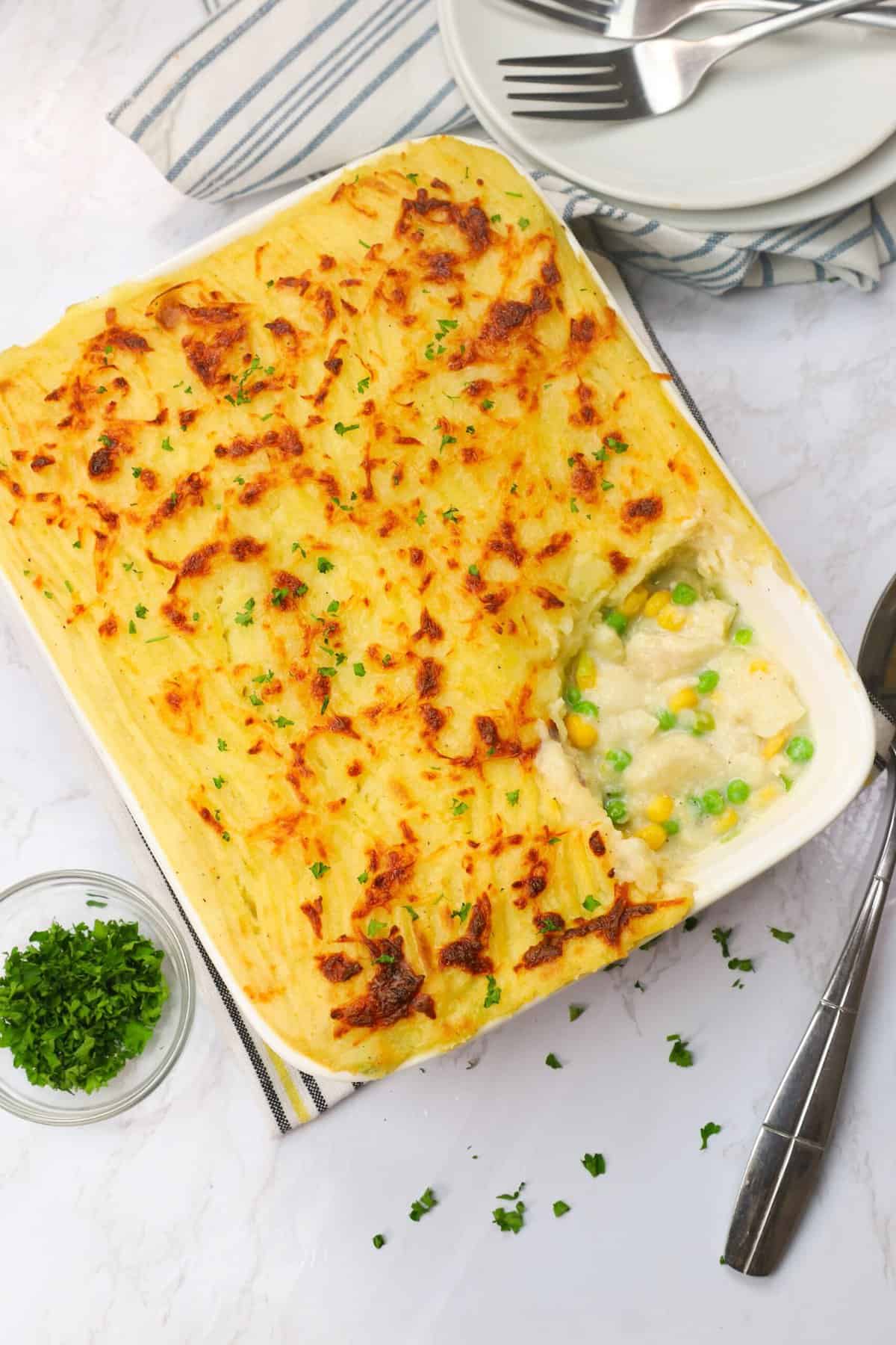 Serving up a delicious freshly baked fish pie