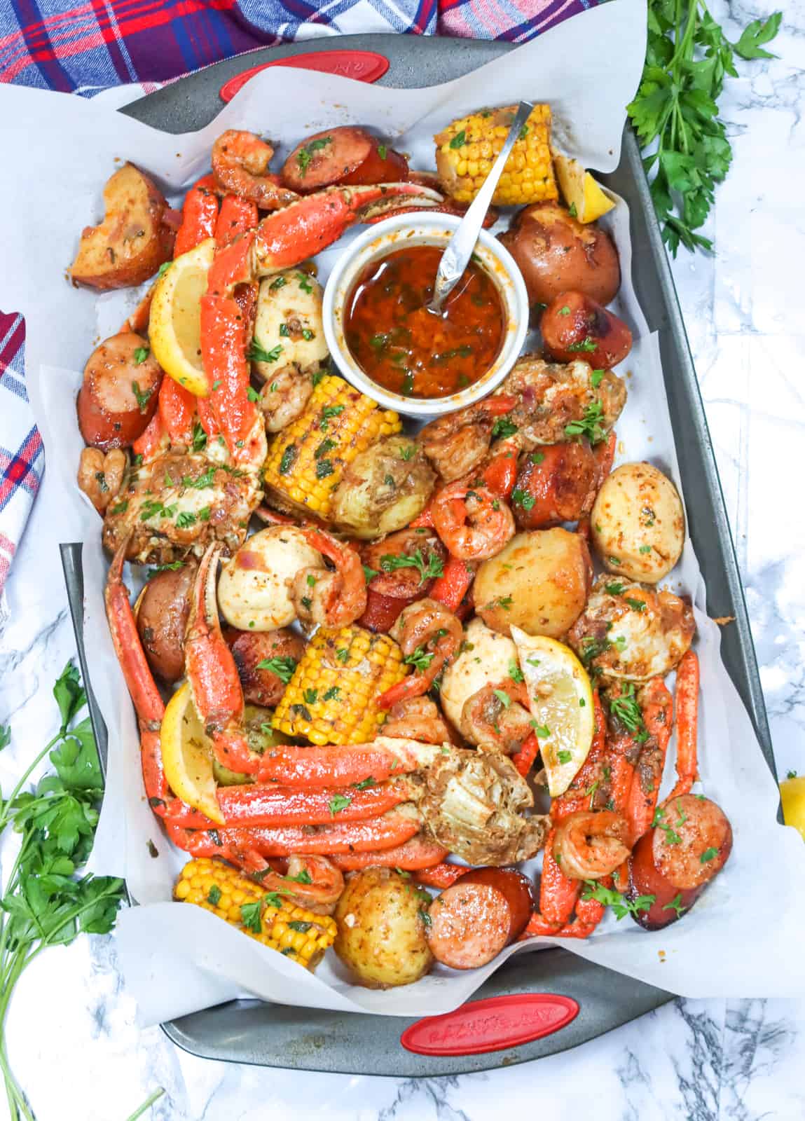 Serving up delicious Seafood Boil in a Bag with hot sauce
