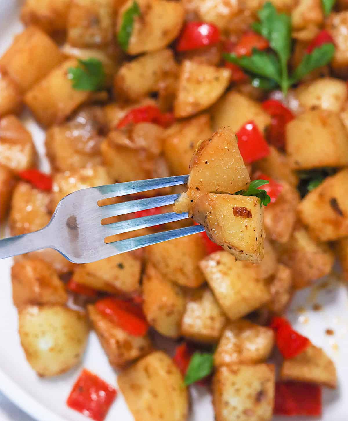 Diving into smothered potatoes for the perfect comfort food