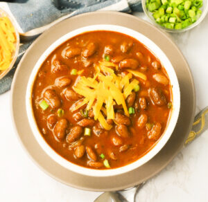 A bowl of Ranch Style Beans, a Tex-Mex specialty with a rich and spicy flavor