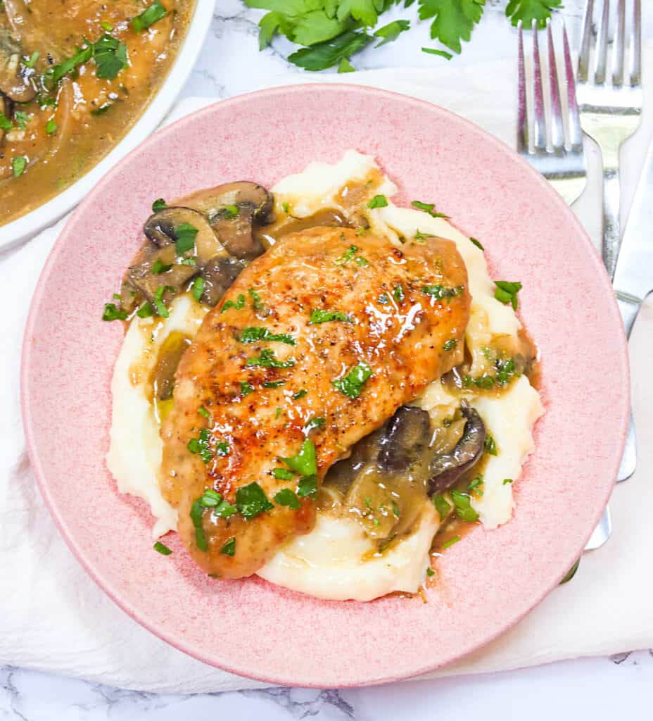 Delectable Smothered Turkey Chops over mashed potatoes for a soul-satisfying dinner