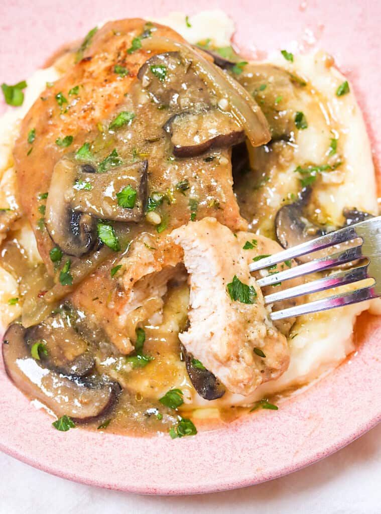 Taking a bite out of insanely delicious Smothered Turkey Chops