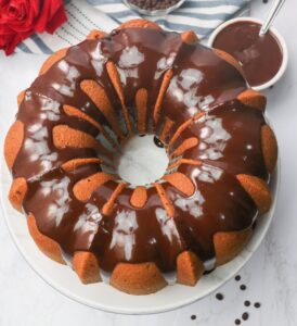 A freshly glazed Chocolate Chip Bundt Cake ready to serve and enjoy