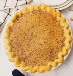 Freshly baked Pinto Bean Pie ready to slice and enjoy