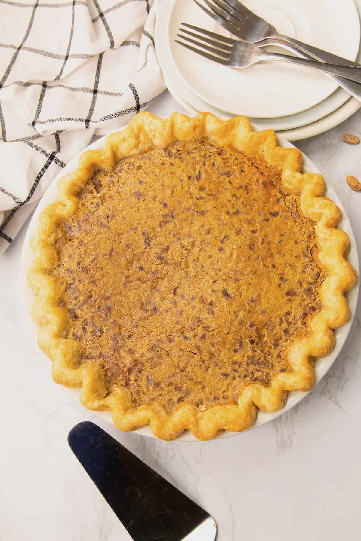 Freshly baked Pinto Bean Pie ready to slice and enjoy