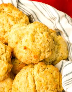 A basket full of freshly baked Buttermilk Drop Biscuits