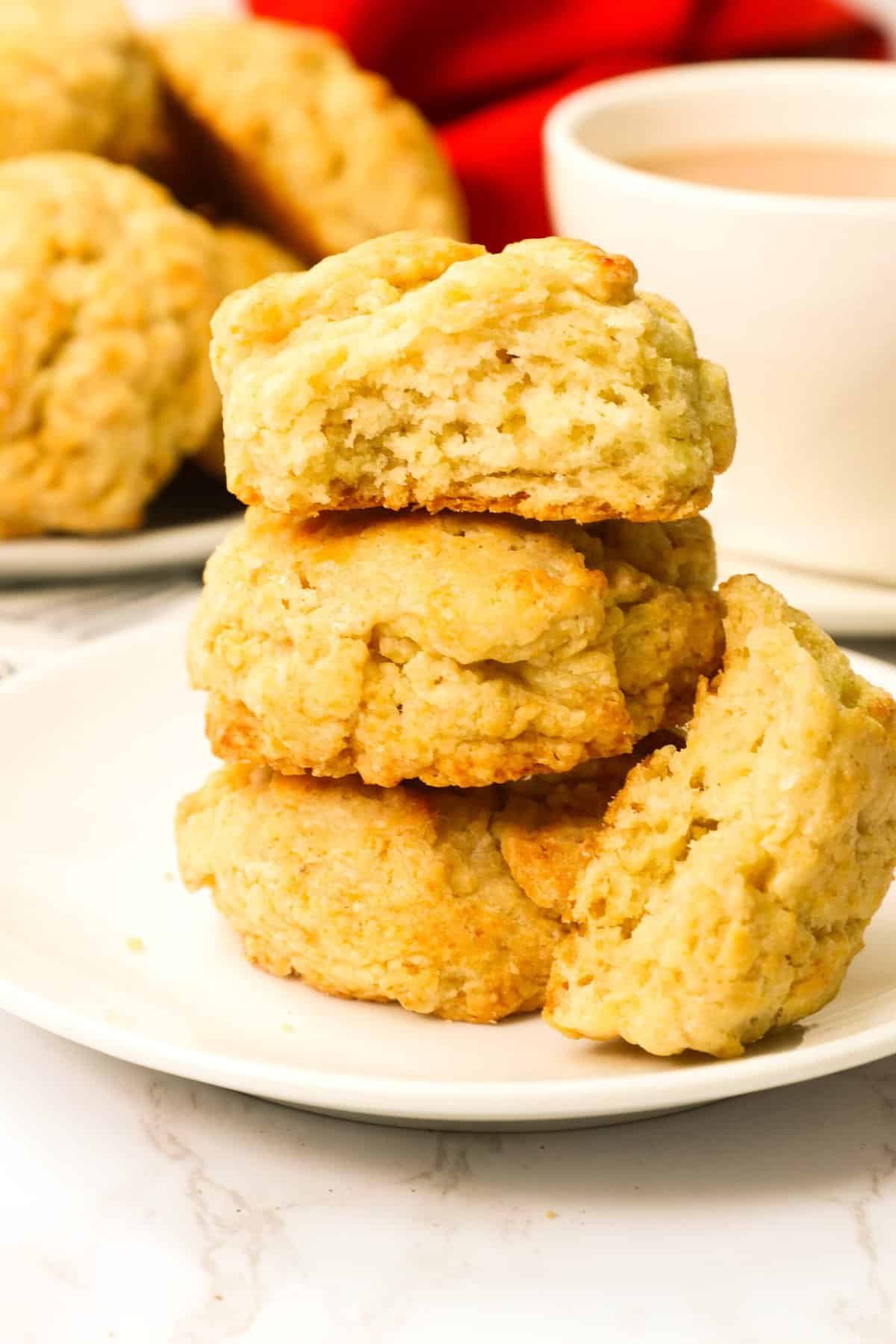 Enjoying into a comfort food Buttermilk Drop Biscuits with a cup of coffee