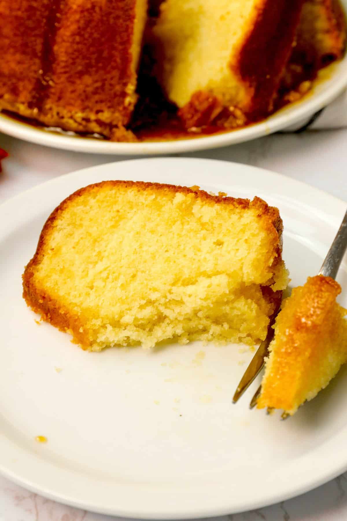 Diving into a decadent slice of rum soaked cake