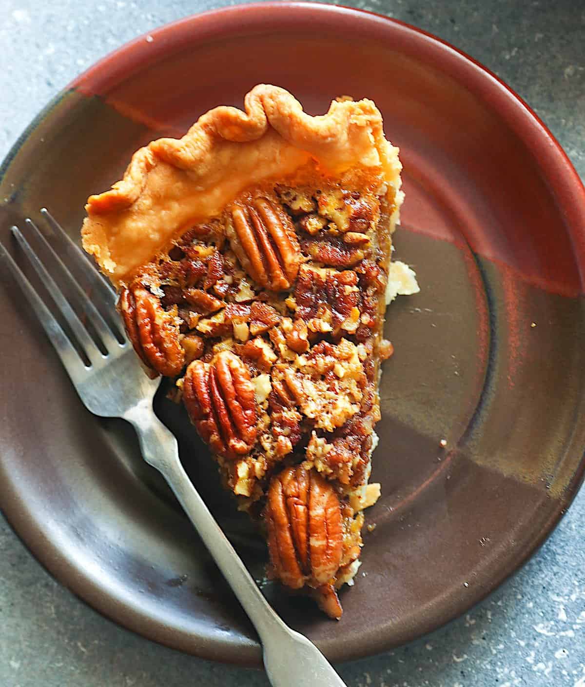 Serving up a slice delightfully sweet pecan pie made with no syrup