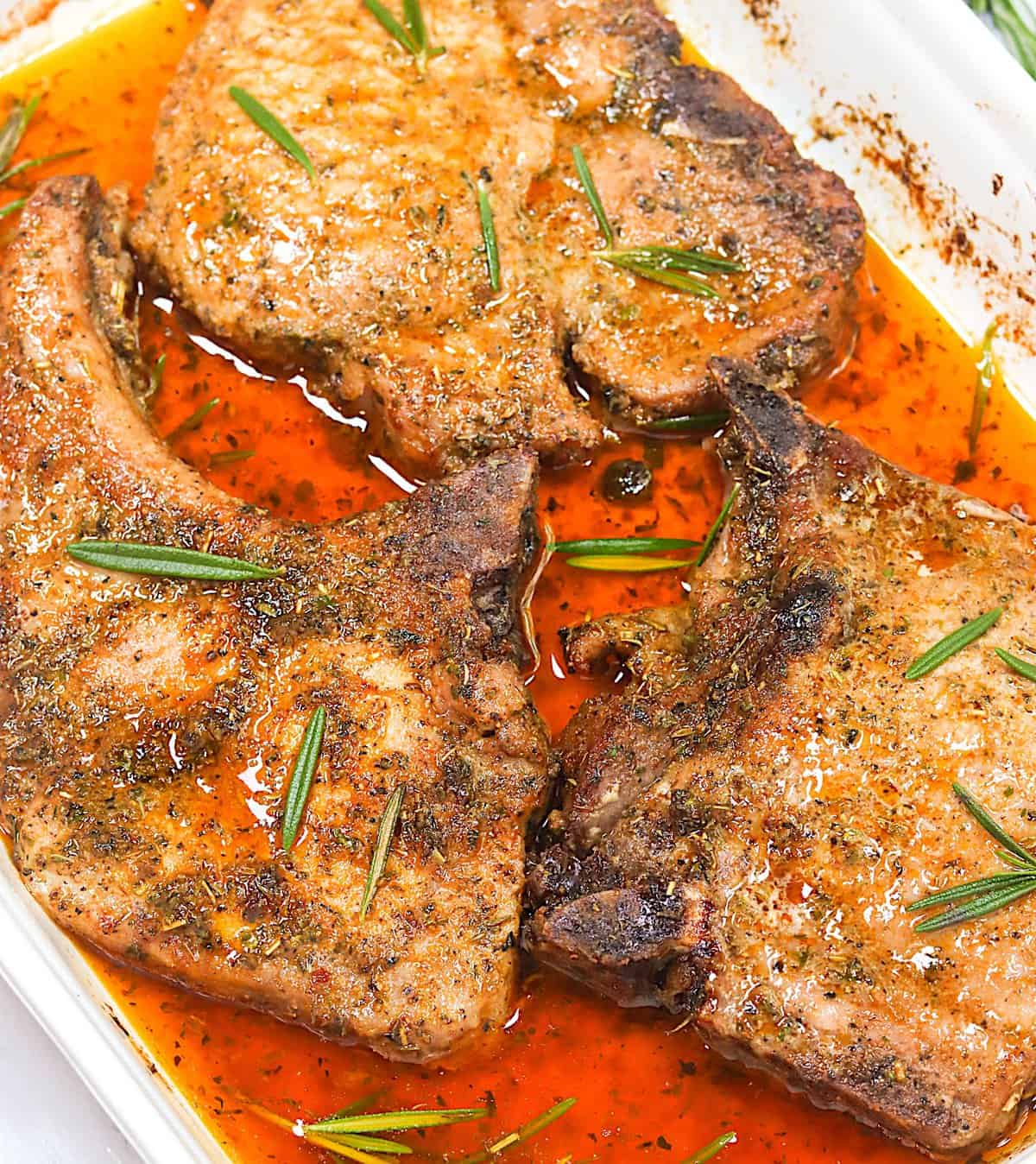 4-Ingredient Oven-Baked Pork Chops fresh from the oven and resting before enjoying