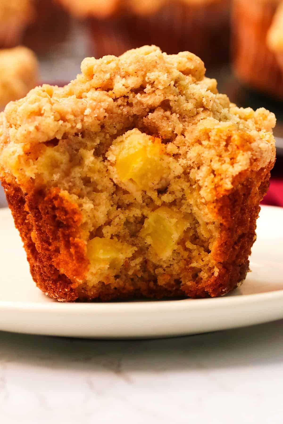 An inside view of a decadent Apple Cinnamon Muffin