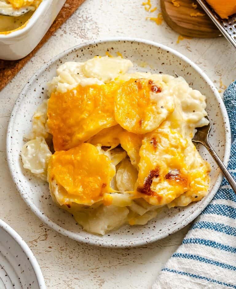 A plateful of creamy scalloped potatoes for classic comfort food.